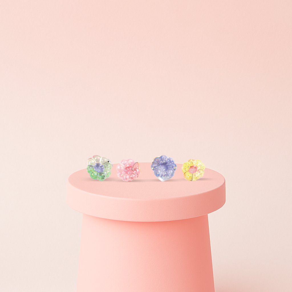 Squishy Bracelet wearable flower-shaped stress relief toys in pink, yellow, green, and purple colors.