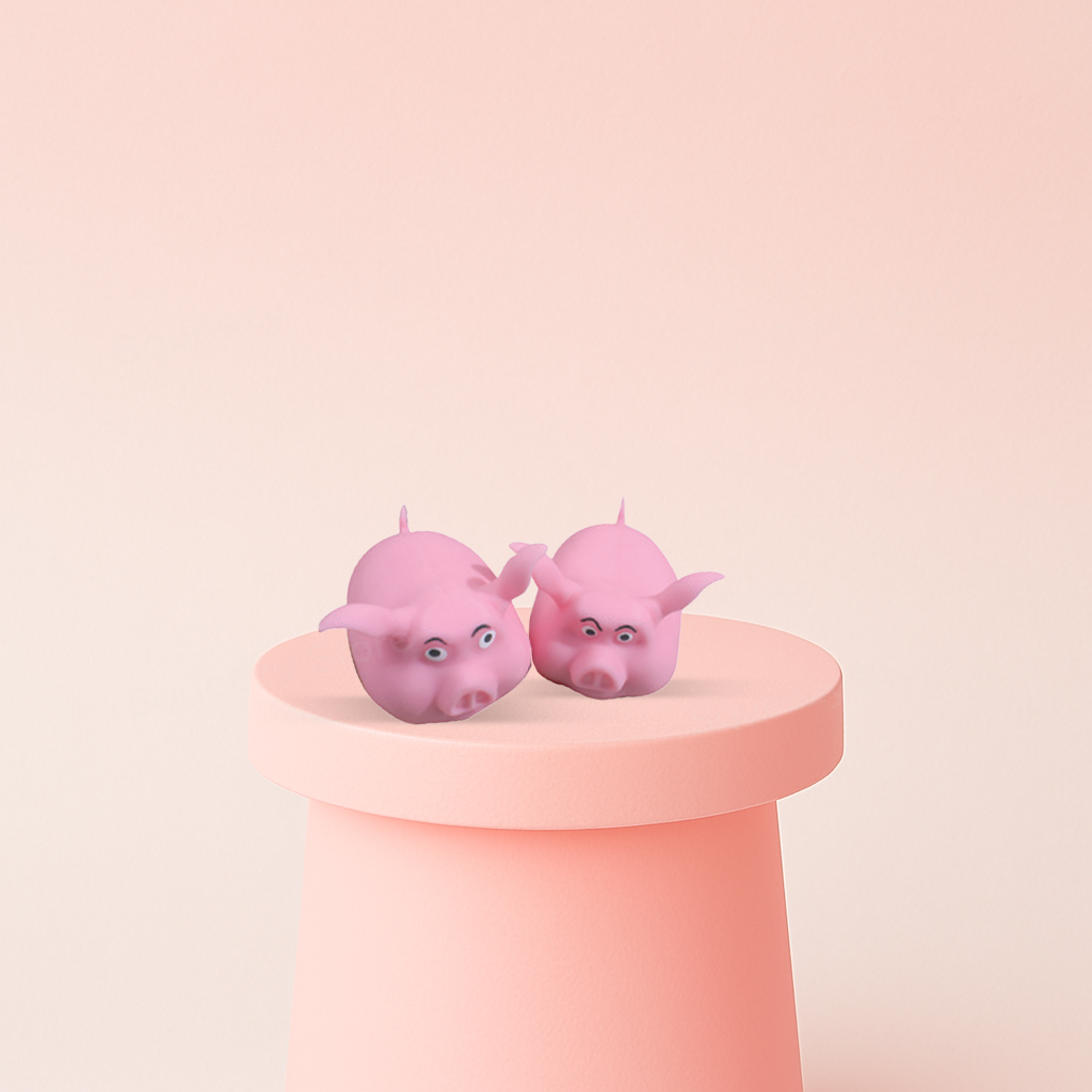 Squishy Flying Pig pink winged pig stress relief toy shown from different angles.
