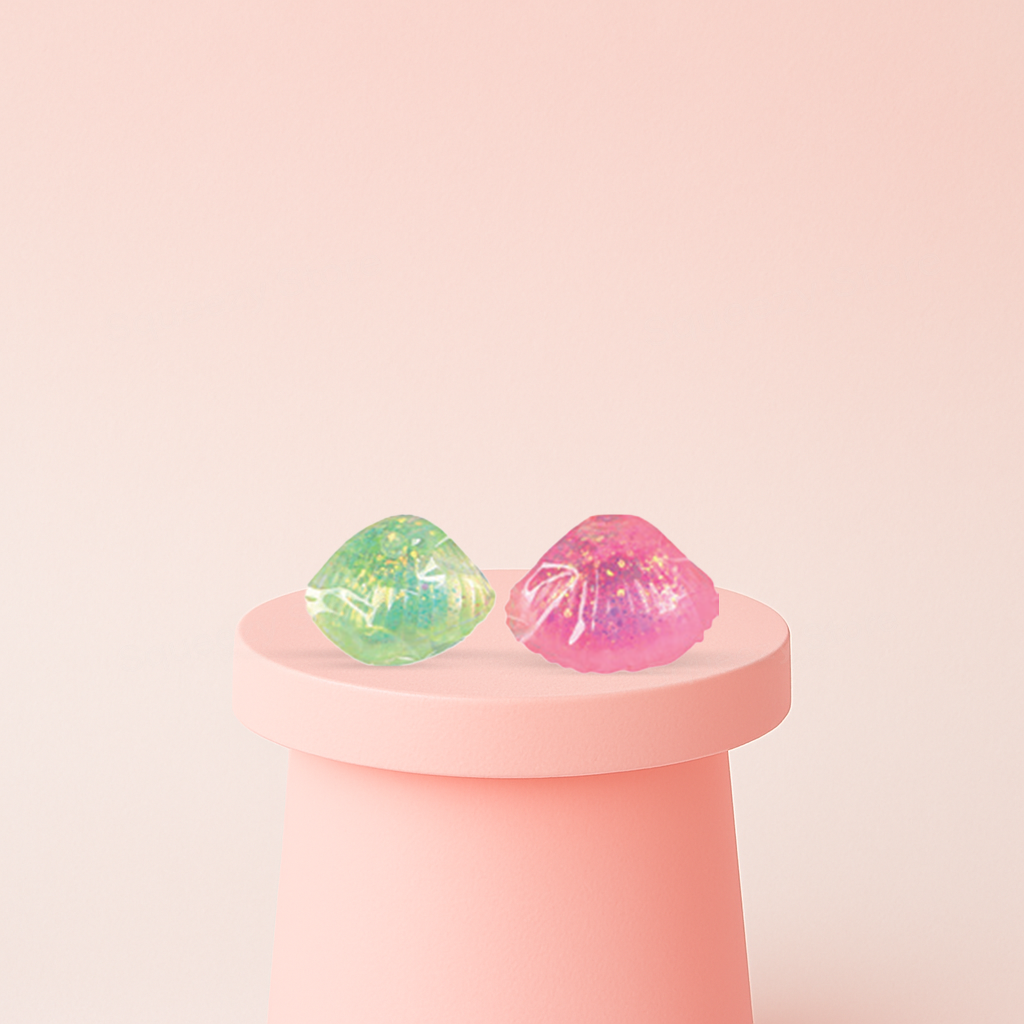Squishy Shell with Maltose soft EVA stress relief toys in green and pink translucent shell designs.