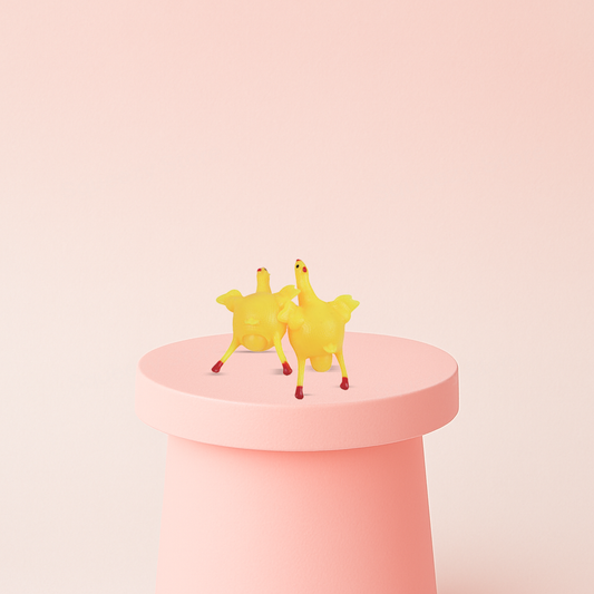Standing Hatching Chick Squishy soft EVA stress relief toy with yellow chick and cracked eggshell.