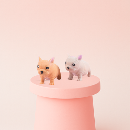 Stretchy Bulldog sensory toys in peach, brown, and white colors.