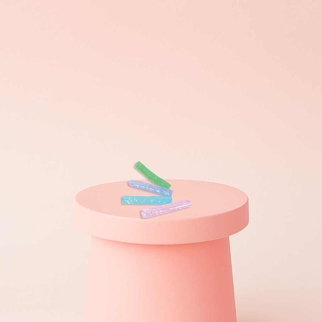 Super Long Water Wiggler glitter-filled sensory tubes in green, blue, purple, and pink colors.