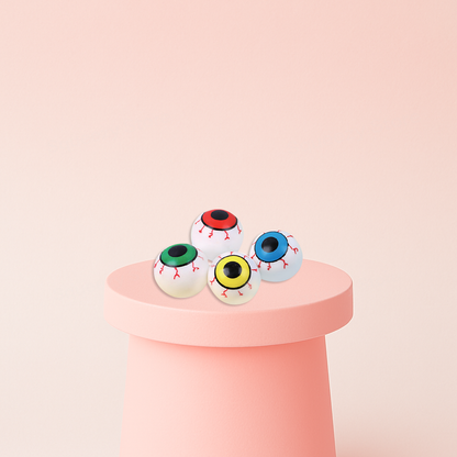 Super Squishy Eye Ball stress relief toys shaped like realistic eyeballs with red, green, yellow, and blue irises.