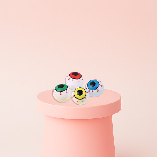 Super Squishy Eye Ball stress relief toys shaped like realistic eyeballs with red, green, yellow, and blue irises.