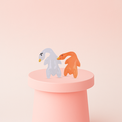 UV Color-Changing Roast Duck Squishies soft EVA stress relief toy shown in white indoor color and orange UV-activated color.
