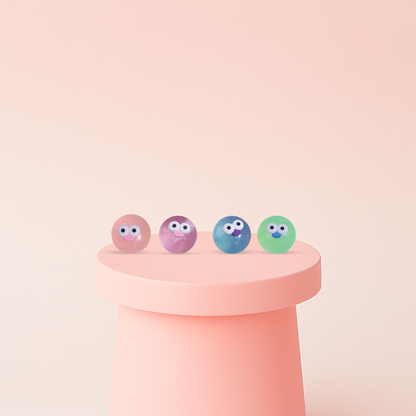 Water Ball with Emoji squishy stress relief balls in pink, purple, blue, and green colors with googly eyes.