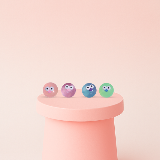 Water Ball with Emoji squishy stress relief balls in pink, purple, blue, and green colors with googly eyes.