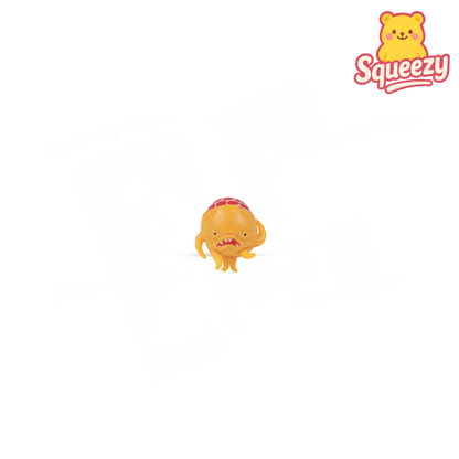 Yellow Monster Mesh Ball soft stress relief toy with winking expression and tentacle-like arms.